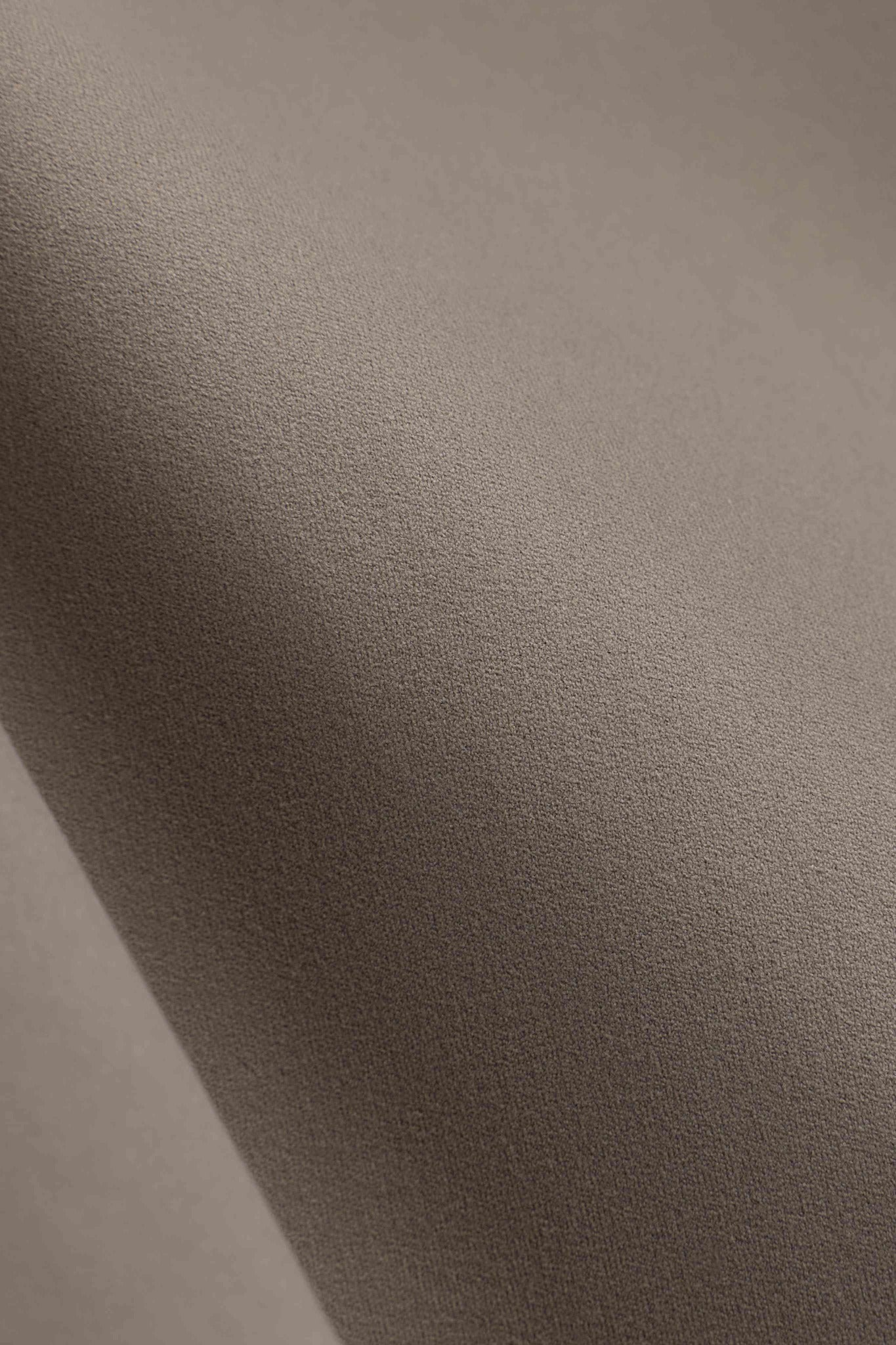Close-up of the soft brushed truffle fabric on the CASPARA Cloudform top.